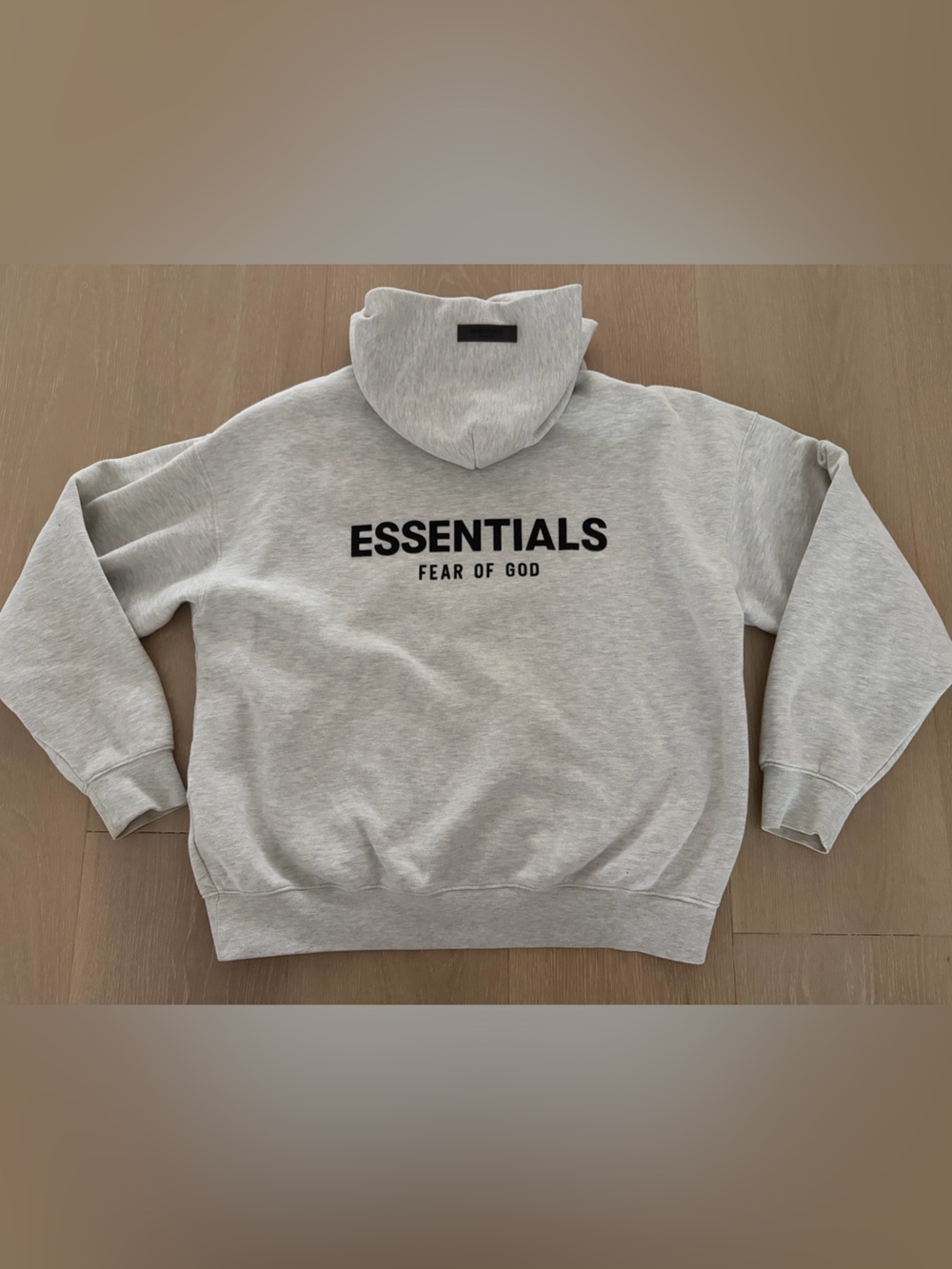 Fear of God Essentials Light Gray hoodie with Black Logo
